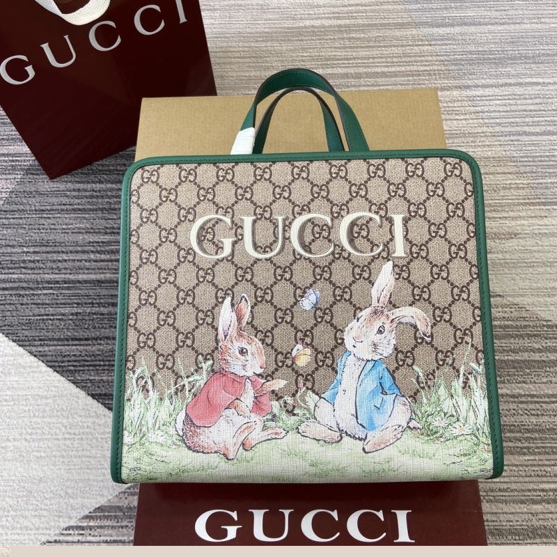 G*u*i shopping bags